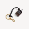 Anhänger in Form einer Parfüm-Miniaturflasche in Schwarz