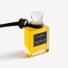 Anhänger in Form einer Parfüm-Miniaturflasche in Schwarz