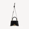 Damen-Handtasche „Hourglass“ XS in Schwarz Damen-Handtasche „Hourglass“ XS in Schwarz