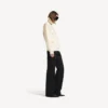 Damen-Pullover mit hohem Kragen, von hinten nach vorne getragen, in Off-White