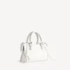 Damen-Tasche „Le City“ klein mit riesigen Nieten und Strasssteinen in Optikweiß Damen-Tasche „Le City“ klein mit riesigen Nieten und Strasssteinen in Optikweiß