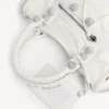 Damen-Tasche „Le City“ klein mit riesigen Nieten und Strasssteinen in Optikweiß Damen-Tasche „Le City“ klein mit riesigen Nieten und Strasssteinen in Optikweiß