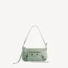 Damen-Tasche „Le City“ mit Riemen in Heritage-Grün Damen-Tasche „Le City“ mit Riemen in Heritage-Grün