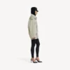 Doppelreihiger Damen-Trenchcoat in Hellbeige Doppelreihiger Damen-Trenchcoat in Hellbeige