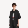 Herren-Hybrid-Kurzarmhemd „The Door“ aus Denim in Schwarz