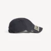Herren-Kappe im Masking-Tape-Look in verblasstem Schwarz Herren-Kappe im Masking-Tape-Look in verblasstem Schwarz