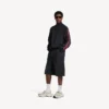 Herren-Sneaker in 3XL mit Anhängern in Weiß/Gelb/Silber/Schwarz Herren-Sneaker in 3XL mit Anhängern in Weiß/Gelb/Silber/Schwarz