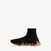 Herren-Sneaker „Speed 2.0“ mit vollständig transparenter Sohle aus recyceltem Strick in Schwarz/Orange