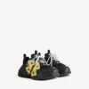 Herren-Sneaker „Triple S Tape Type“ in Schwarz/Gelb Herren-Sneaker „Triple S Tape Type“ in Schwarz/Gelb
