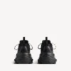 Herren-Sneaker „Triple S Tape Type“ in Schwarz/Gelb Herren-Sneaker „Triple S Tape Type“ in Schwarz/Gelb