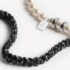 Malibu-Perlenarmband/Halskette in Schwarz/Weiß/Glänzendem Silber Malibu-Perlenarmband/Halskette in Schwarz/Weiß/Glänzendem Silber