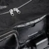 Superbusy Sling Bag Large in Schwarz