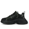 Triple S Sneaker „Allover Logo – Schwarz Fluo-Gelb“ 536737W2FA11070