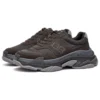 Triple S Sneaker „Dark Brown Grey“ 710157W3CU41819